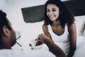 Man Is Feeding His Girlfriend With A Strawberry. Royalty Free Stock Photo