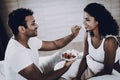 Man Is Feeding His Girlfriend With A Strawberry. Royalty Free Stock Photo