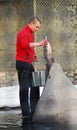 A man feeding sea lion with a big fish