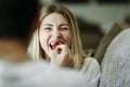 Man feeding a strawberry to his girlfriend Royalty Free Stock Photo