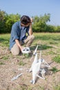 Man with crashed drone Royalty Free Stock Photo