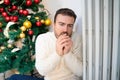 Man suffering cold at home and problem with house heating during Christmas Royalty Free Stock Photo