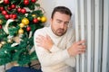 Man feeling cold at home with home heating trouble during Christmas Royalty Free Stock Photo