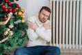 Man feeling cold at home with home heating trouble during Christmas Royalty Free Stock Photo