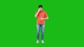 Man feeling sick and nauseous. Green background