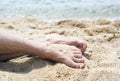 Man feet on a beach Royalty Free Stock Photo