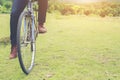 Man feet pedal bike in the nature park, Ready to ride.