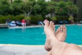 Man feet at swimming pool Royalty Free Stock Photo