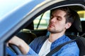 Tired man sleeps in car Royalty Free Stock Photo