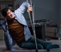 Man fell off wheelchair sitting on the floor Royalty Free Stock Photo