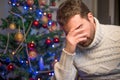 Man felling depressed and lonely during the christmas time