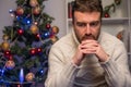 Man felling depressed and lonely during the christmas time