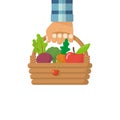 Man fermer hold basket vegetables