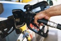 Man filling gasoline fuel in car at gas station Royalty Free Stock Photo