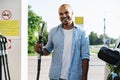 Man filling gasoline fuel in car at gas station Royalty Free Stock Photo