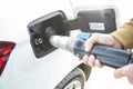 Man filling his car`s tank with compressed natural gas Royalty Free Stock Photo