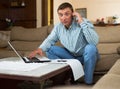 Man filling out financial documents Royalty Free Stock Photo