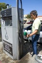 Man filling tank with biodiesel fuel