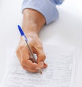 Man filling tax form Royalty Free Stock Photo