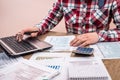 Man filling tax form with business report, Royalty Free Stock Photo