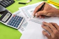 Man filling tax form with pen Royalty Free Stock Photo