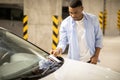 Man finding a ticket fine because of parking violation Royalty Free Stock Photo