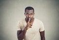 Man with finger on lips gesture keep quiet Royalty Free Stock Photo