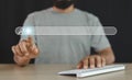 Man finger pointing at searching for information with computer keyboard. Using search website. Royalty Free Stock Photo