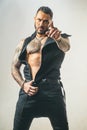 Man finger pointing. Strong man showing his perfect naked body. Bare torso. Royalty Free Stock Photo