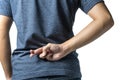 Man fingers crossed behind a backside Royalty Free Stock Photo