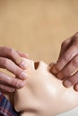 Man In First Aid Class Performing Mouth To Mouth Resuscitation O Royalty Free Stock Photo