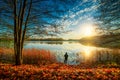 man fishing in fall sunrise