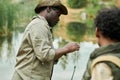 Man fishing with his son Royalty Free Stock Photo