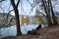 Man fishing at Lake Bled. Royalty Free Stock Photo