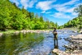 Man Fishing in Lake Placid, New York Royalty Free Stock Photo