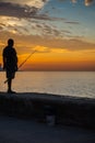 Man fishing at Malecon, in Havana, Cuba.