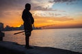 Man fishing at Malecon, in Havana, Cuba.