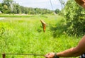 Man with a fishing net in hands. Illegal poacher