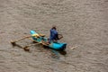 Man fishing from an outrigger canoe