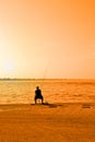 Man fishing on the pier Royalty Free Stock Photo