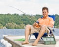 Man fishing on pier Royalty Free Stock Photo