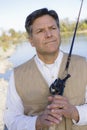 Man With Fishing Pole Royalty Free Stock Photo