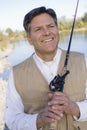 Man With Fishing Pole Royalty Free Stock Photo