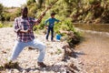 Man fishing and pulling fish