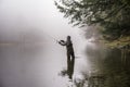 Man fishing in a river Royalty Free Stock Photo