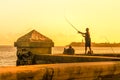 Man fishing during a sunset in Havana Royalty Free Stock Photo