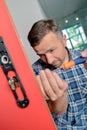 Man fitting new lock to door Royalty Free Stock Photo