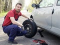 Man fixing a car problem Royalty Free Stock Photo