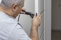 Man changing the door lock at home Royalty Free Stock Photo