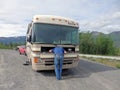 A man fixing a motor home